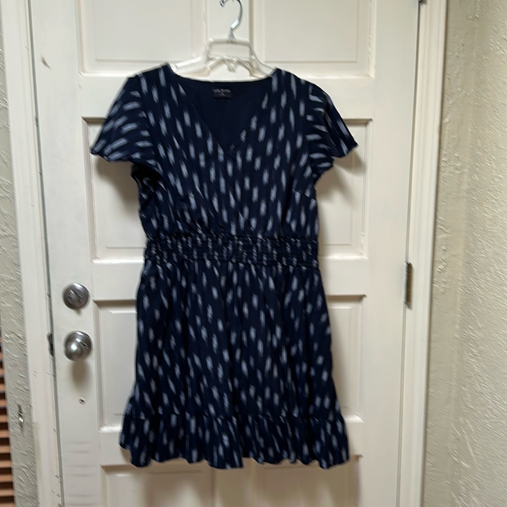 This dress has POCKETS! smocked waist, ruffled hem and flutter sleeves